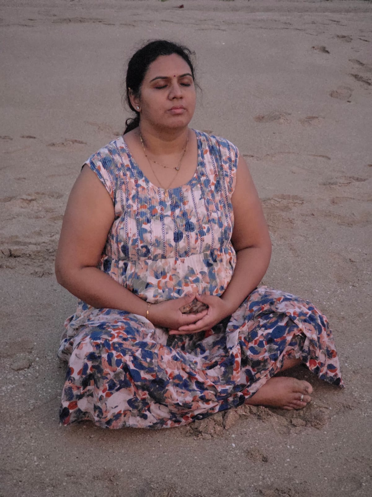 A lady performing meditation